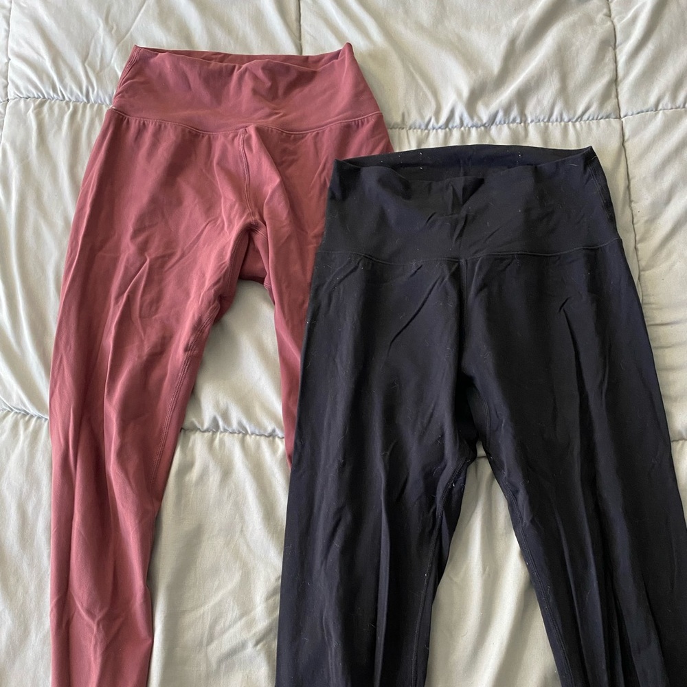 2 pairs of Buff Bunny leggings - high waist black and rose color, size medium.